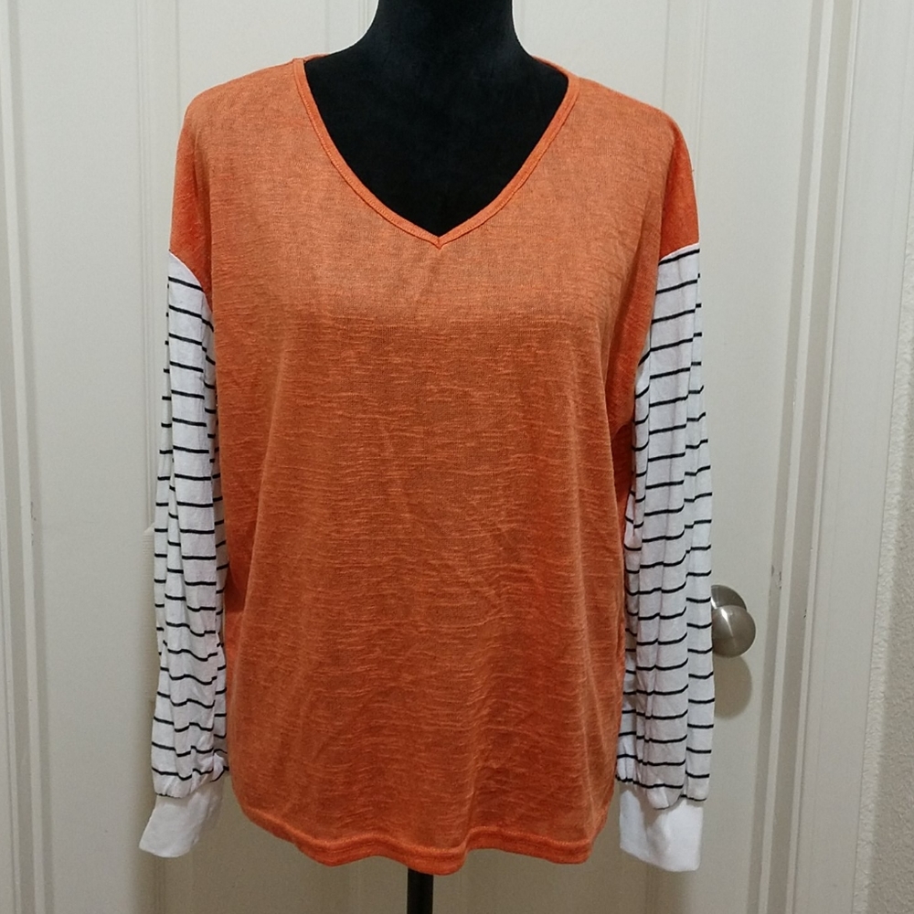 Orange black and cream striped top